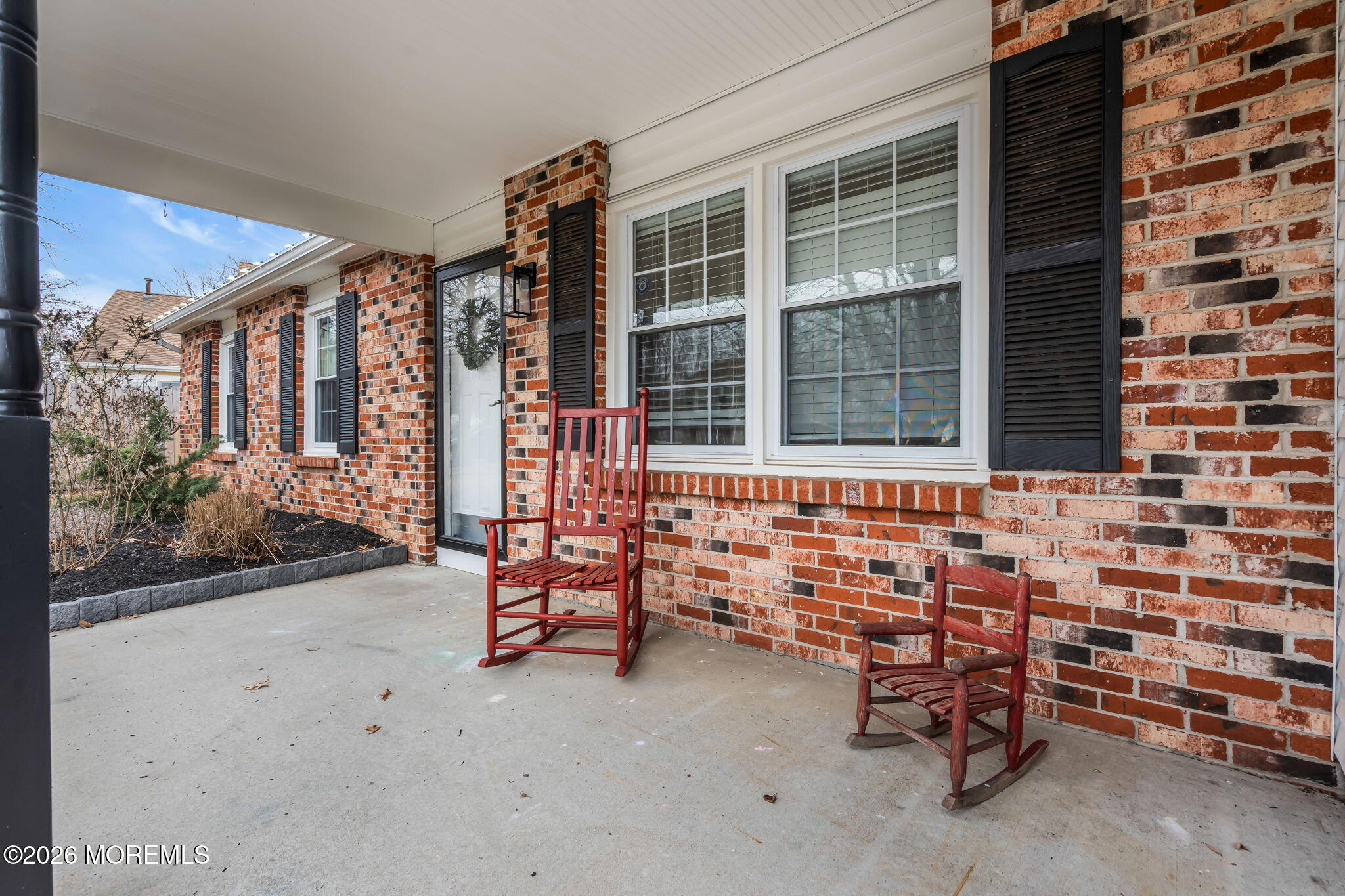 19 Virginia Drive Howell, NJ 07731 - Photo 6 of 38 a view of front door of house with outdoor seating