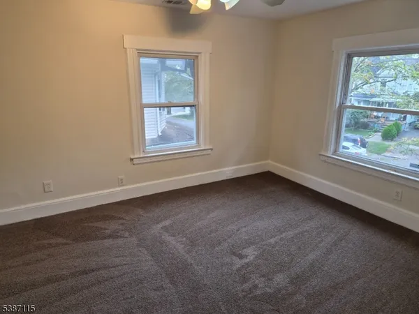 a view of a room that has a window