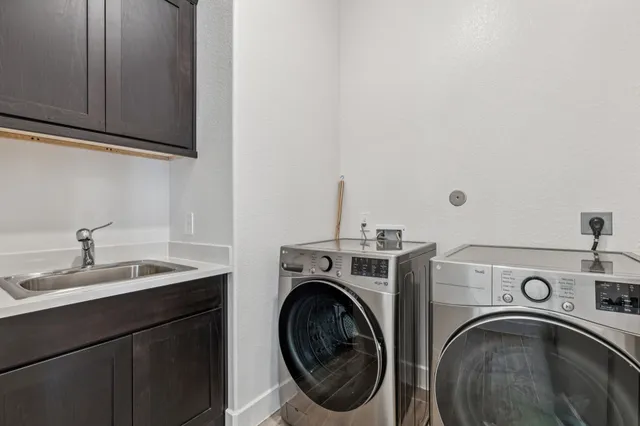 a bathroom with a sink toilet and mirror