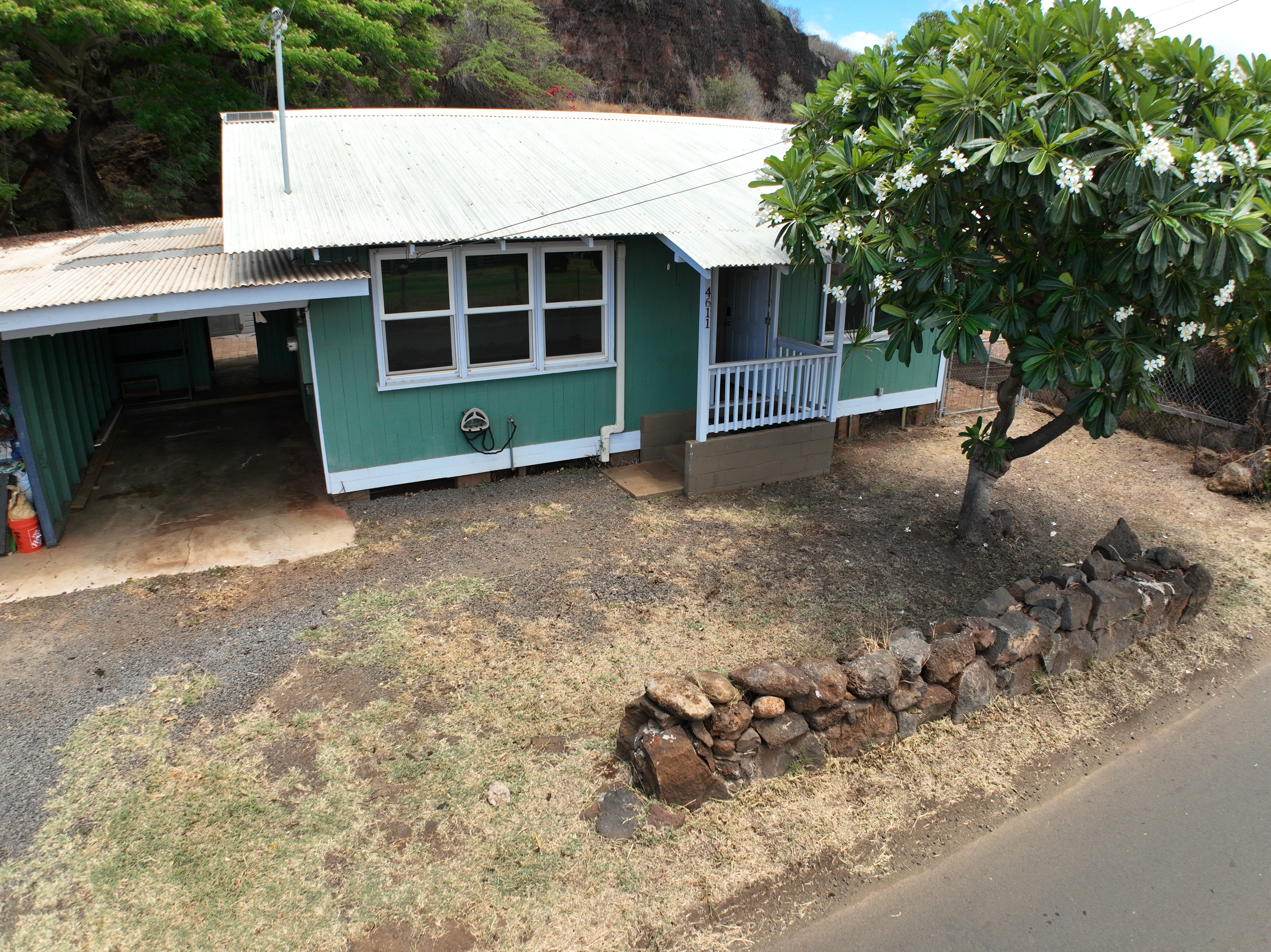 4611 Menehune Road, Unit 2 Waimea, HI 96796 - Photo 1 of 25 a view of a backyard