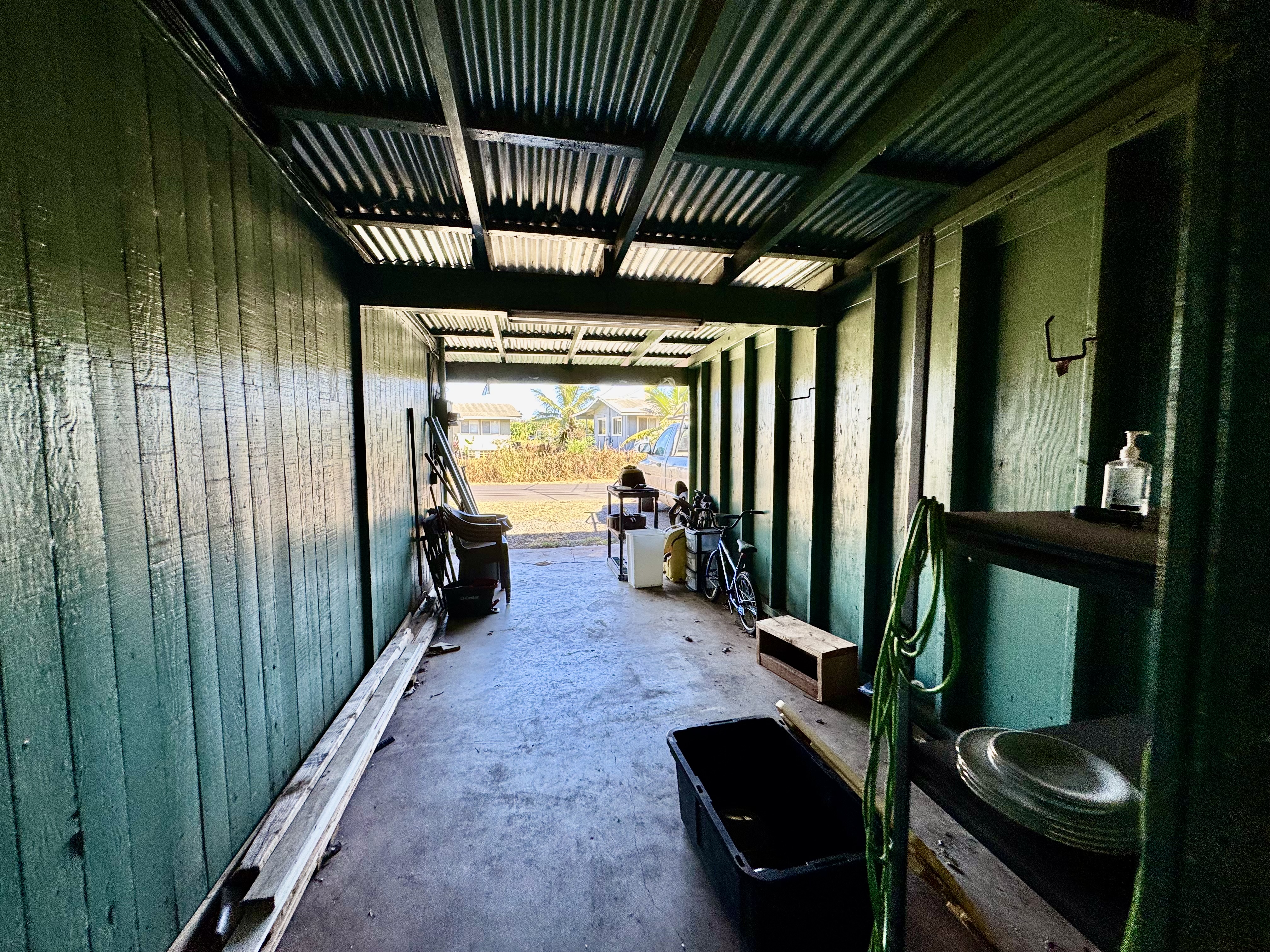4611 Menehune Road, Unit 2 Waimea, HI 96796 - Photo 7 of 25 a view of a porch with furniture