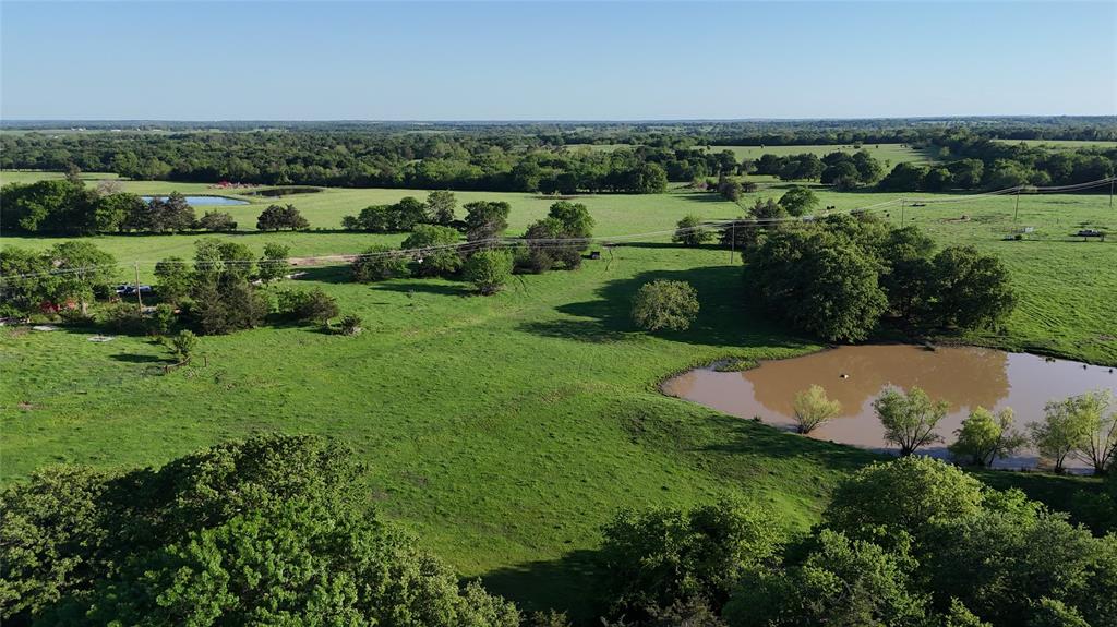 1 Dripping Springs Road Denison, TX 75021 - Photo 13 of 20 an aerial view of a houses with a yard