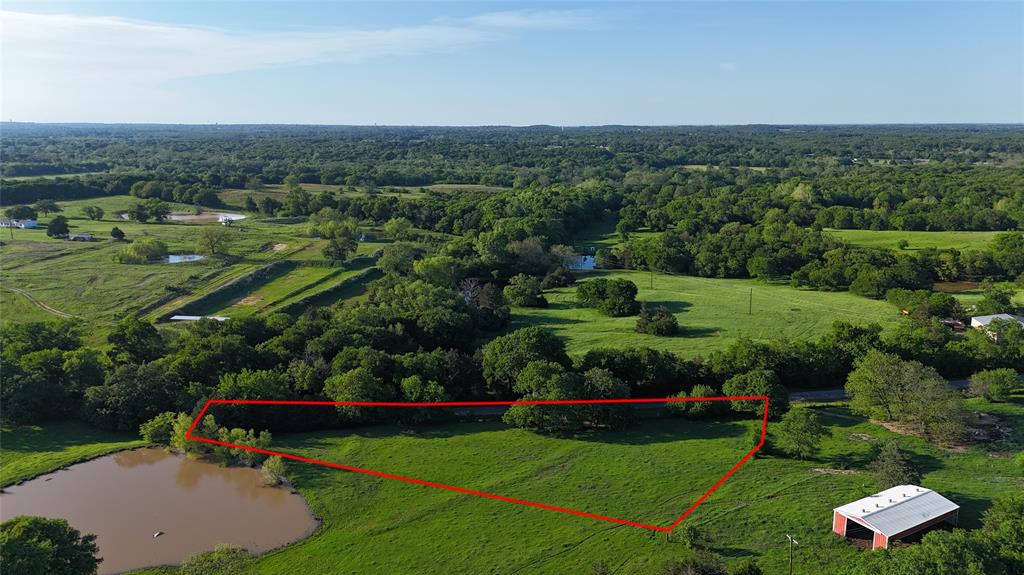 1 Dripping Springs Road Denison, TX 75021 - Photo 17 of 20 an aerial view of a house with a garden