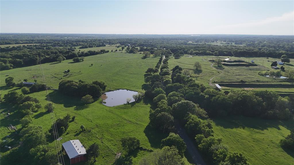 1 Dripping Springs Road Denison, TX 75021 - Photo 8 of 20 an aerial view of a house with a yard