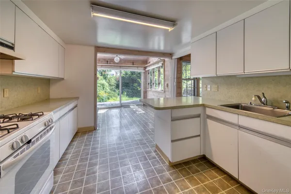 a view of a porch with furniture