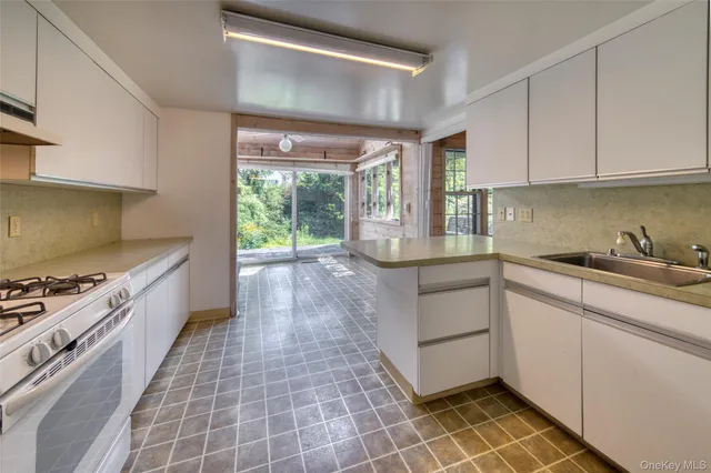 a view of a porch with furniture