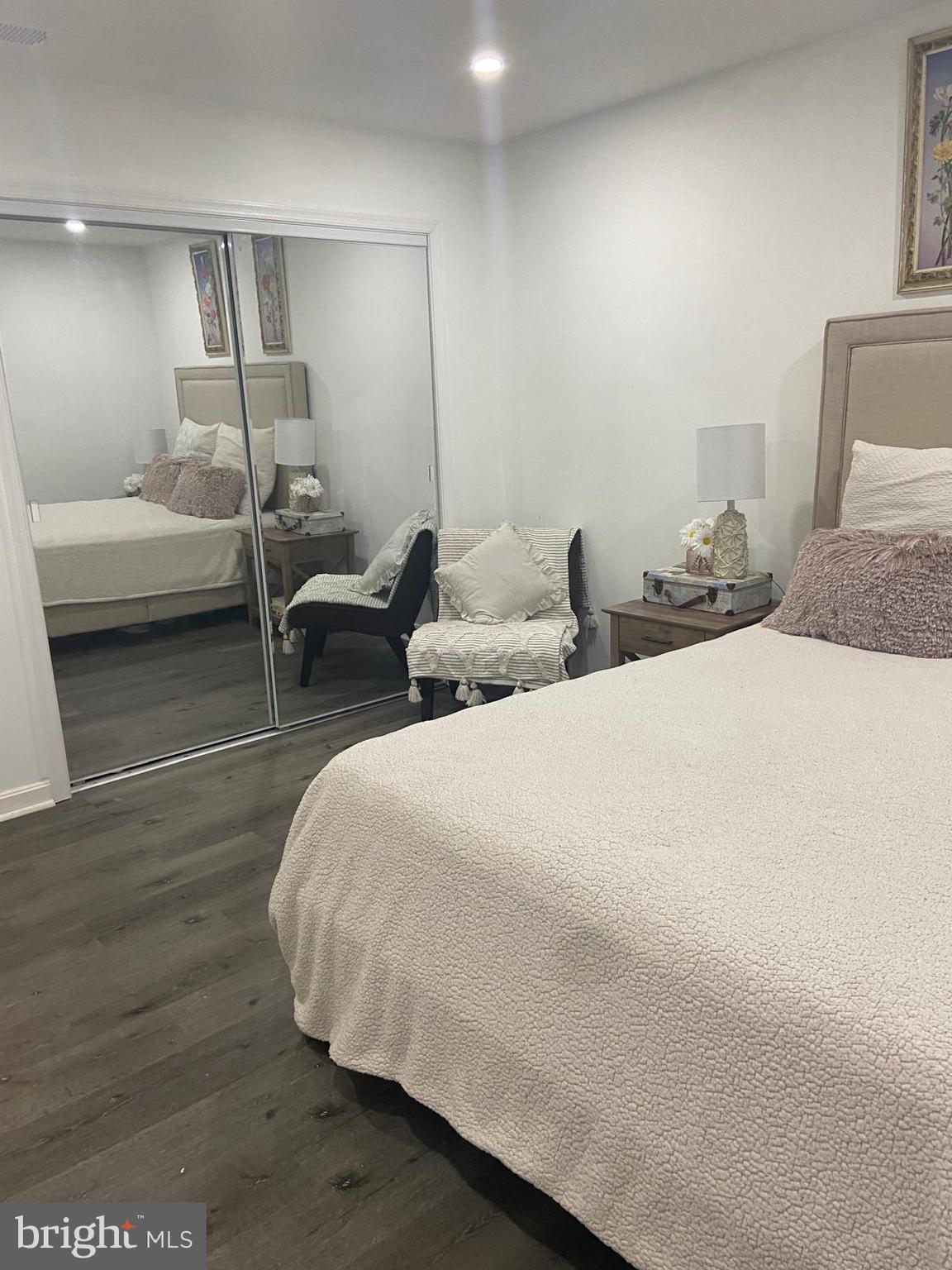 5900 K Surrey Hill Place, Unit 697 Springfield, VA 22152 - Photo 11 of 32 a bedroom with two beds and a couch