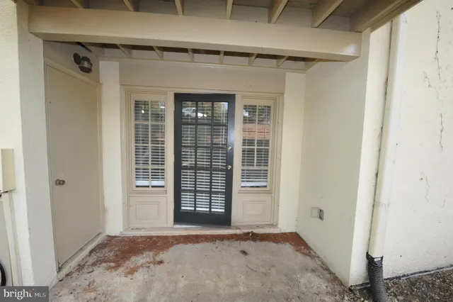 a view of hallway with windows