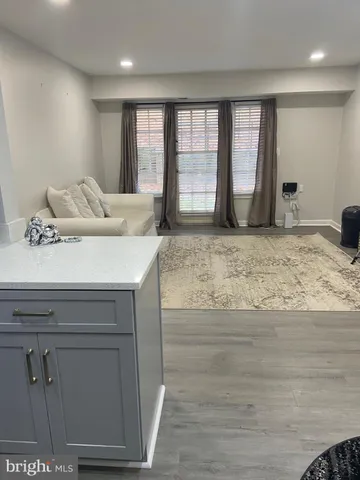 a utility room with sink dryer and washer