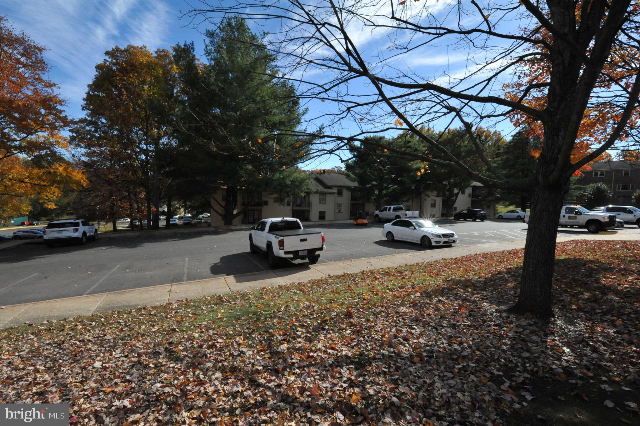 5900 K Surrey Hill Place, Unit 697 Springfield, VA 22152 - Photo 21 of 32 a view of car parked on the side of a street