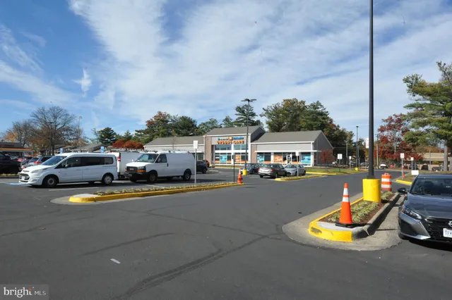 a view of a car park in front of building