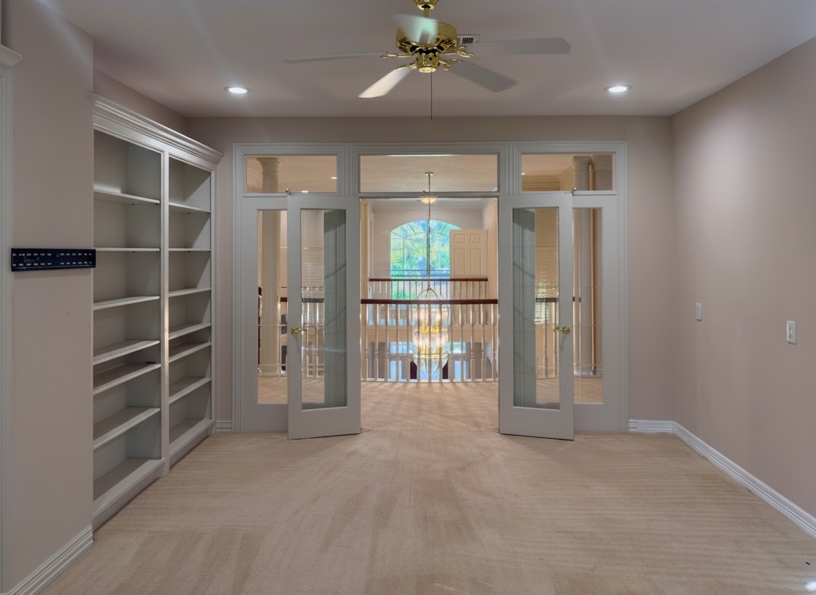3311 El Dorado Boulevard Missouri City, TX 77459 - Photo 17 of 29 a view of an empty room with a fireplace
