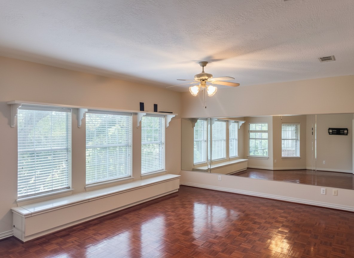 3311 El Dorado Boulevard Missouri City, TX 77459 - Photo 20 of 29 a view of an empty room with wooden floor and a window