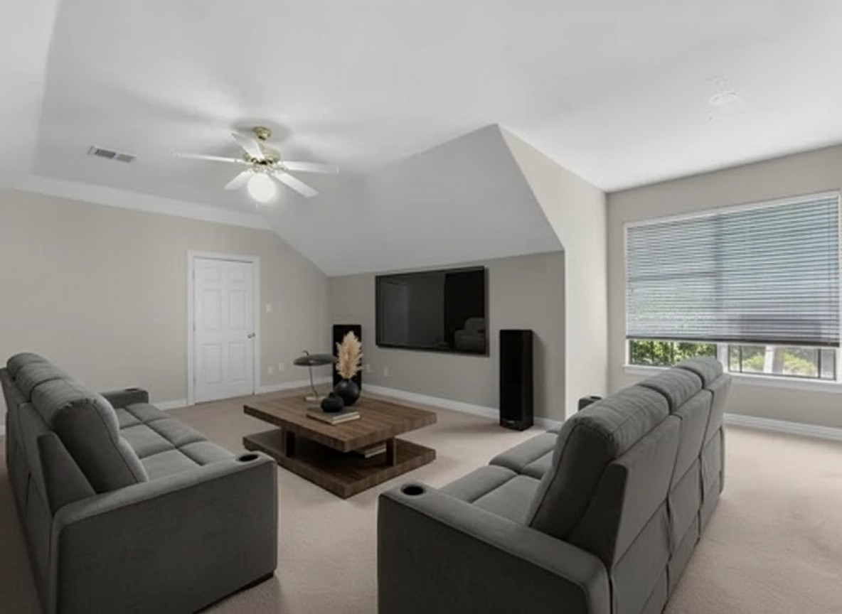 3311 El Dorado Boulevard Missouri City, TX 77459 - Photo 24 of 29 a living room with furniture and a flat screen tv