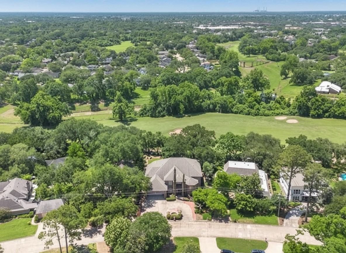 3311 El Dorado Boulevard Missouri City, TX 77459 - Photo 28 of 29 an aerial view of residential houses with outdoor space and trees