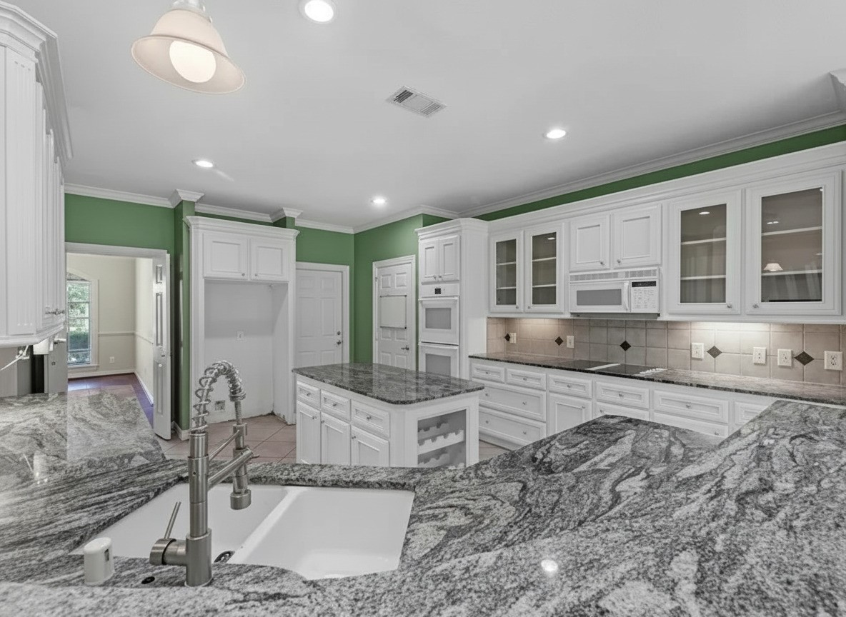 3311 El Dorado Boulevard Missouri City, TX 77459 - Photo 8 of 29 a large kitchen with stainless steel appliances granite countertop a granite counter top and a refrigerator