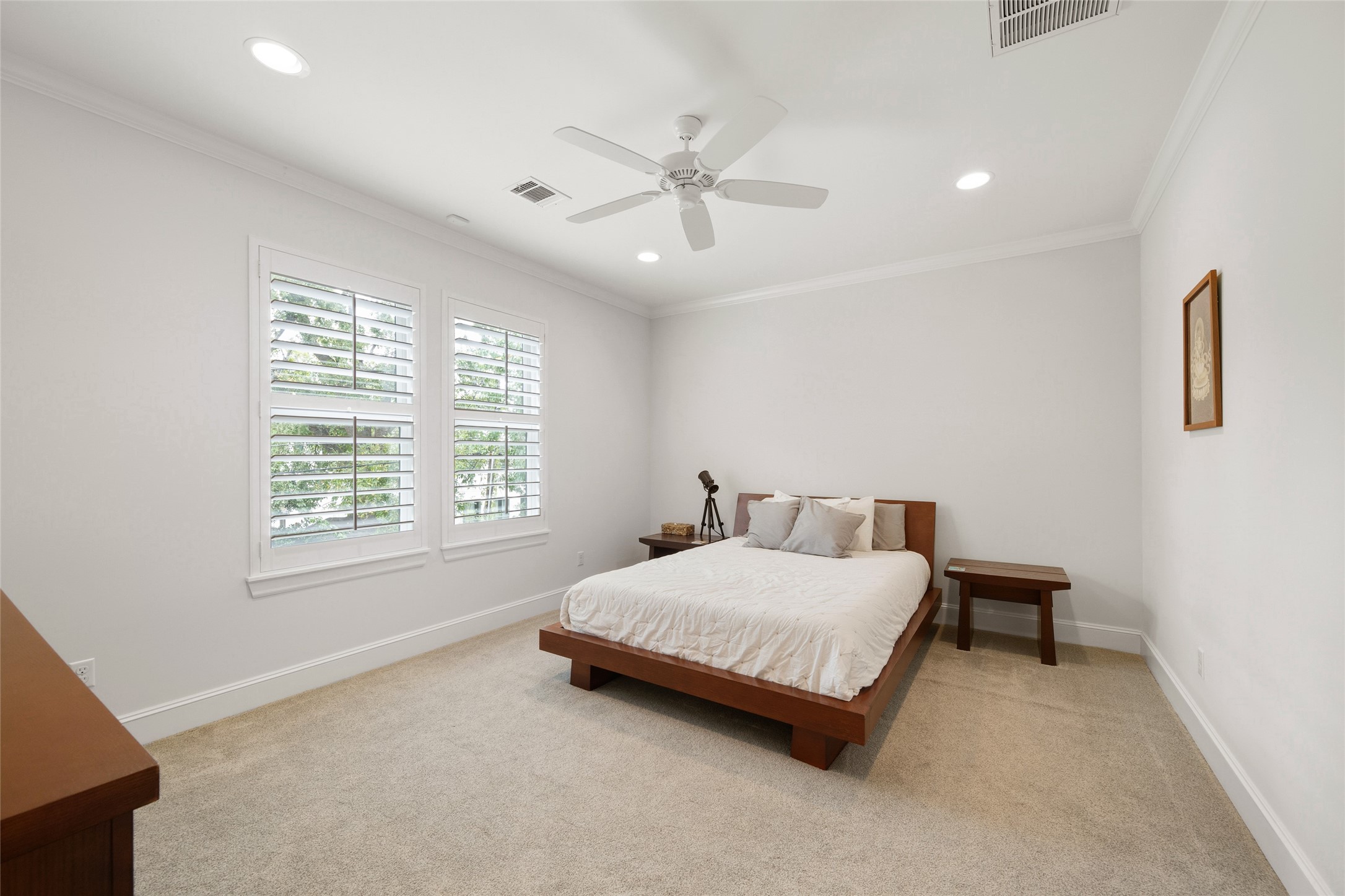 1118 Anderson Street Bellaire, TX 77401 - Photo 33 of 45 a bedroom with a bed and window