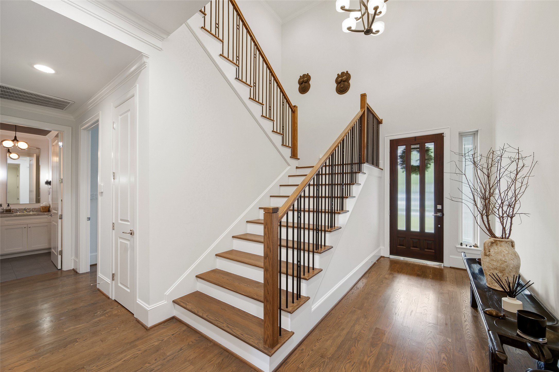 1118 Anderson Street Bellaire, TX 77401 - Photo 5 of 45 a view of entryway with wooden floor and stairs