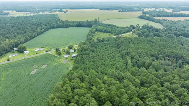 a view of a lake with a yard