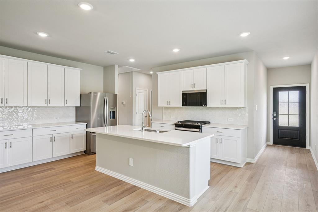 1608 Arches Road Anna, TX 75409 - Photo 2 of 23 Photo is not of the actual home, but is an inspirational photo of builder’s model home and may depict options, furnishings, and/or decorator features that are not included.