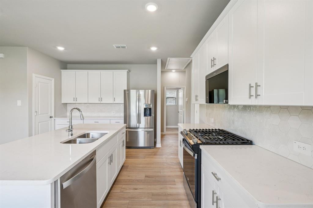 1608 Arches Road Anna, TX 75409 - Photo 3 of 23 Photo is not of the actual home, but is an inspirational photo of builder’s model home and may depict options, furnishings, and/or decorator features that are not included.