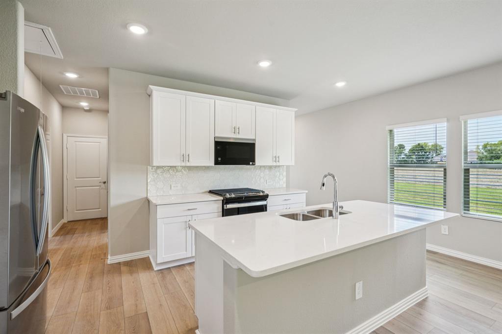 1608 Arches Road Anna, TX 75409 - Photo 5 of 23 Photo is not of the actual home, but is an inspirational photo of builder’s model home and may depict options, furnishings, and/or decorator features that are not included.