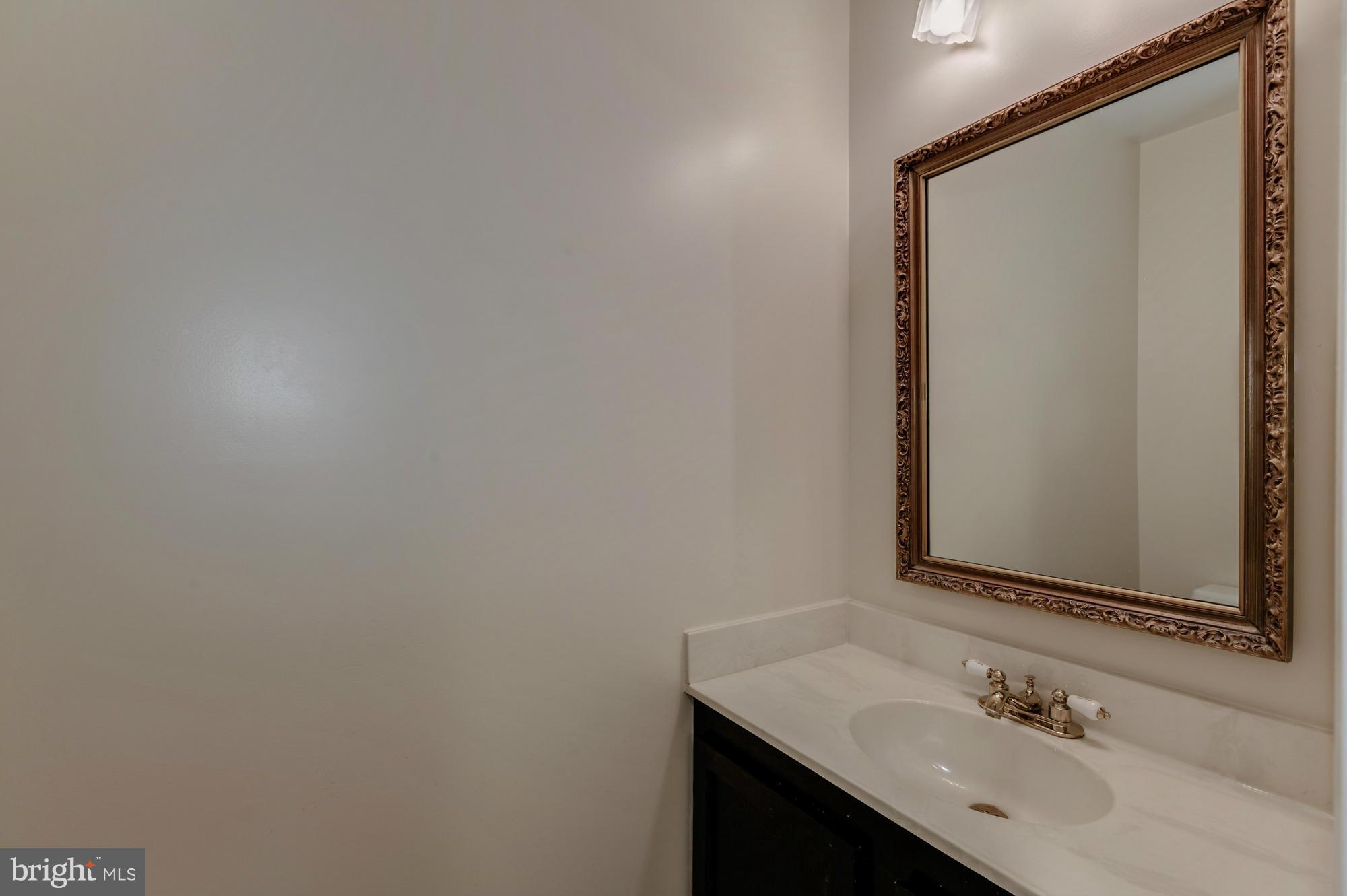11923 Sentinel Point Court Reston, VA 20191 - Photo 5 of 30 Convenient Main Level Powder Room
