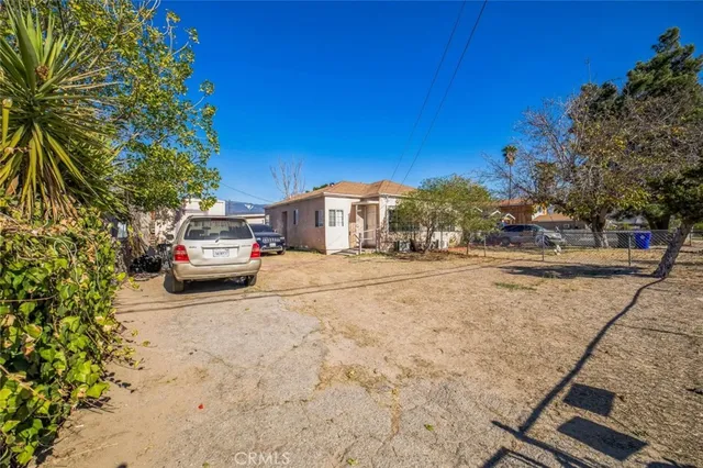 a view of a road with a building in the background