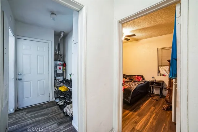 a view of a room that has a bed and a closet