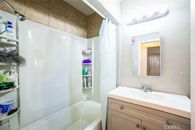 a bathroom with a sink and a bathtub