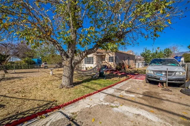 a car parked in front of a house