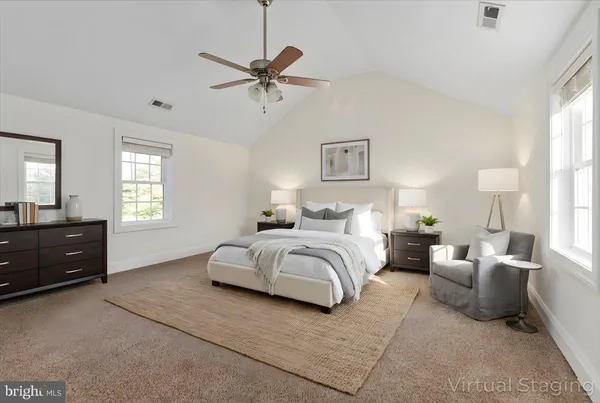 a bed room with a bed and a night stand