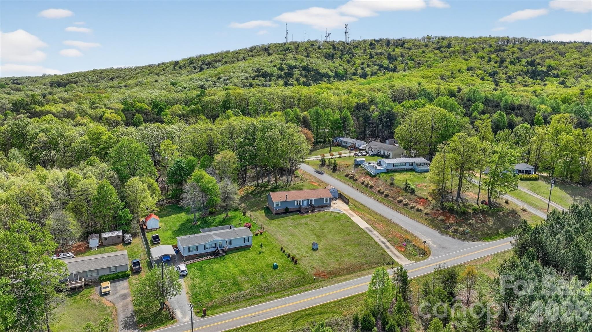 4352 Anderson Mountain Road Maiden, NC 28650 - Photo 40 of 42 a view of a yard with an outdoor seating