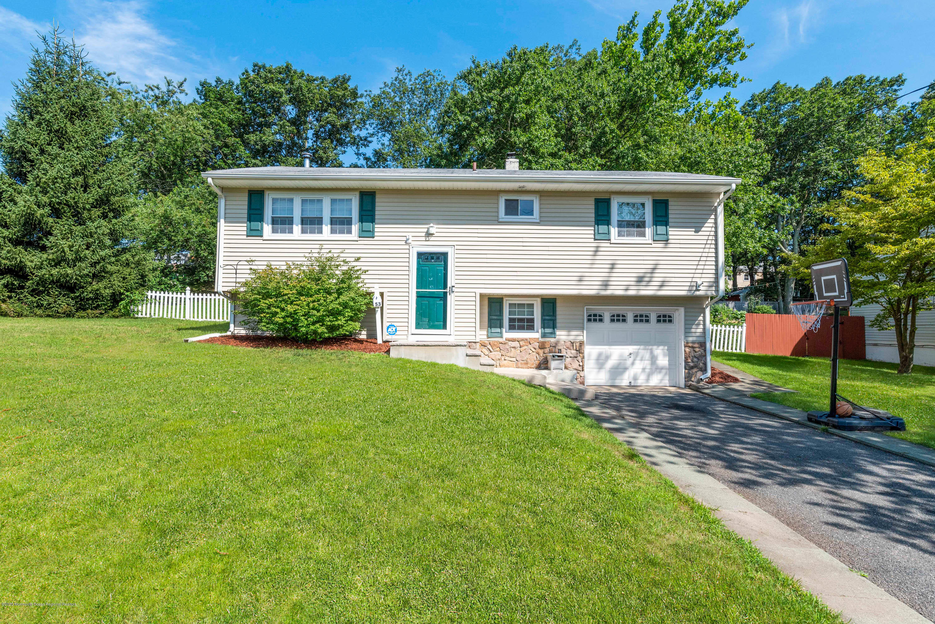 53 Salem Hill Road Howell, NJ 07731 - Photo 1 of 27 a view of a house with a yard and sitting area