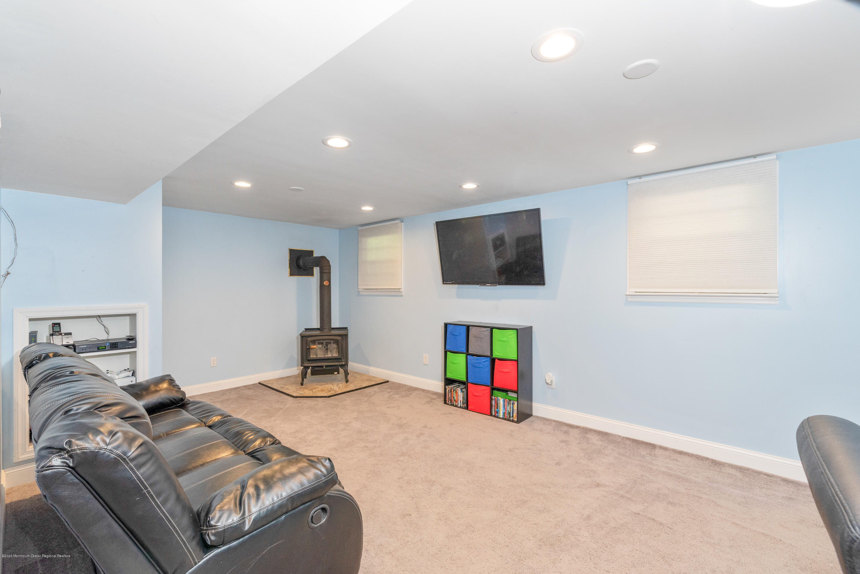 53 Salem Hill Road Howell, NJ 07731 - Photo 16 of 27 a bedroom with bed and a flat tv screen on the dresser