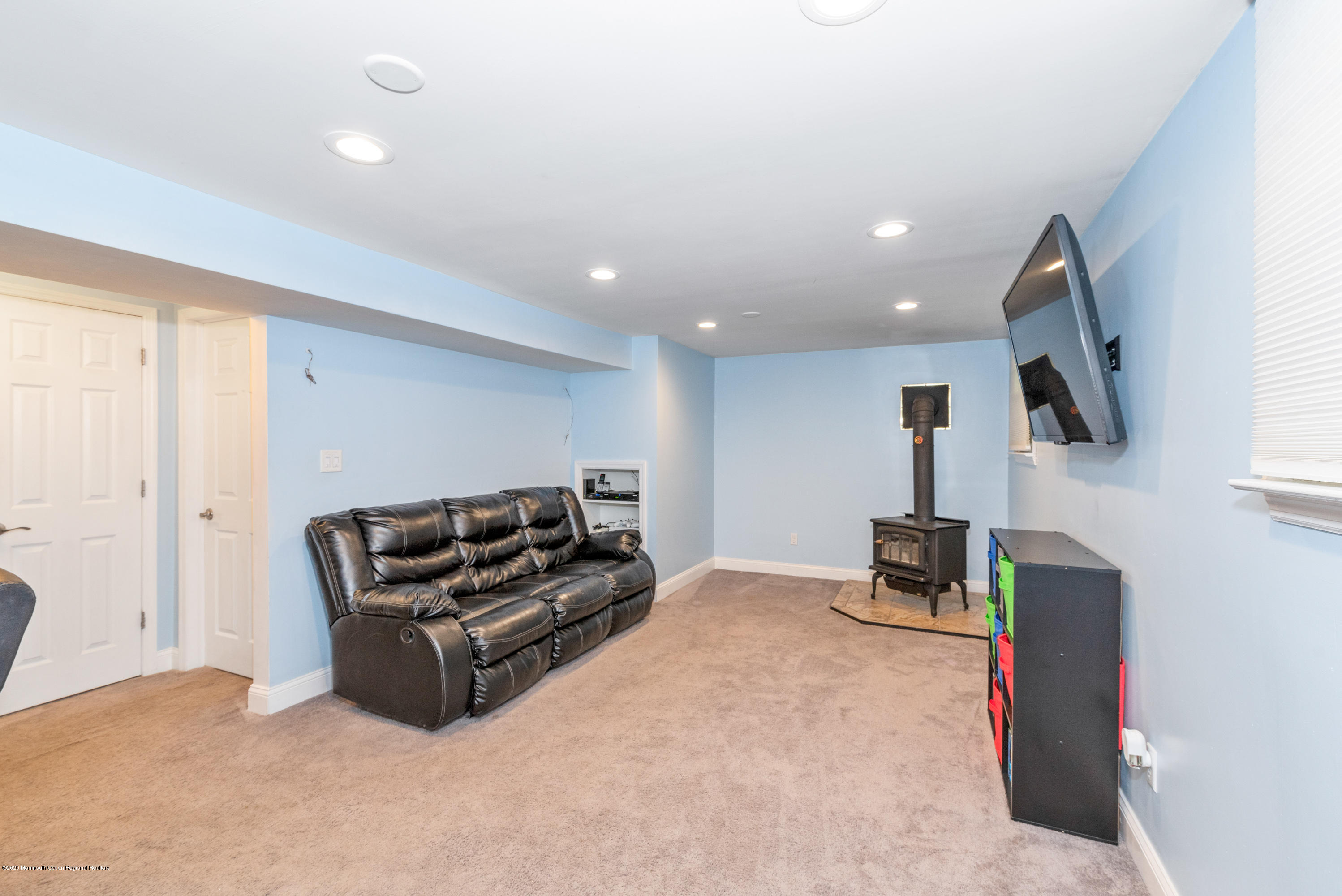 53 Salem Hill Road Howell, NJ 07731 - Photo 17 of 27 a living room with furniture and a flat screen tv