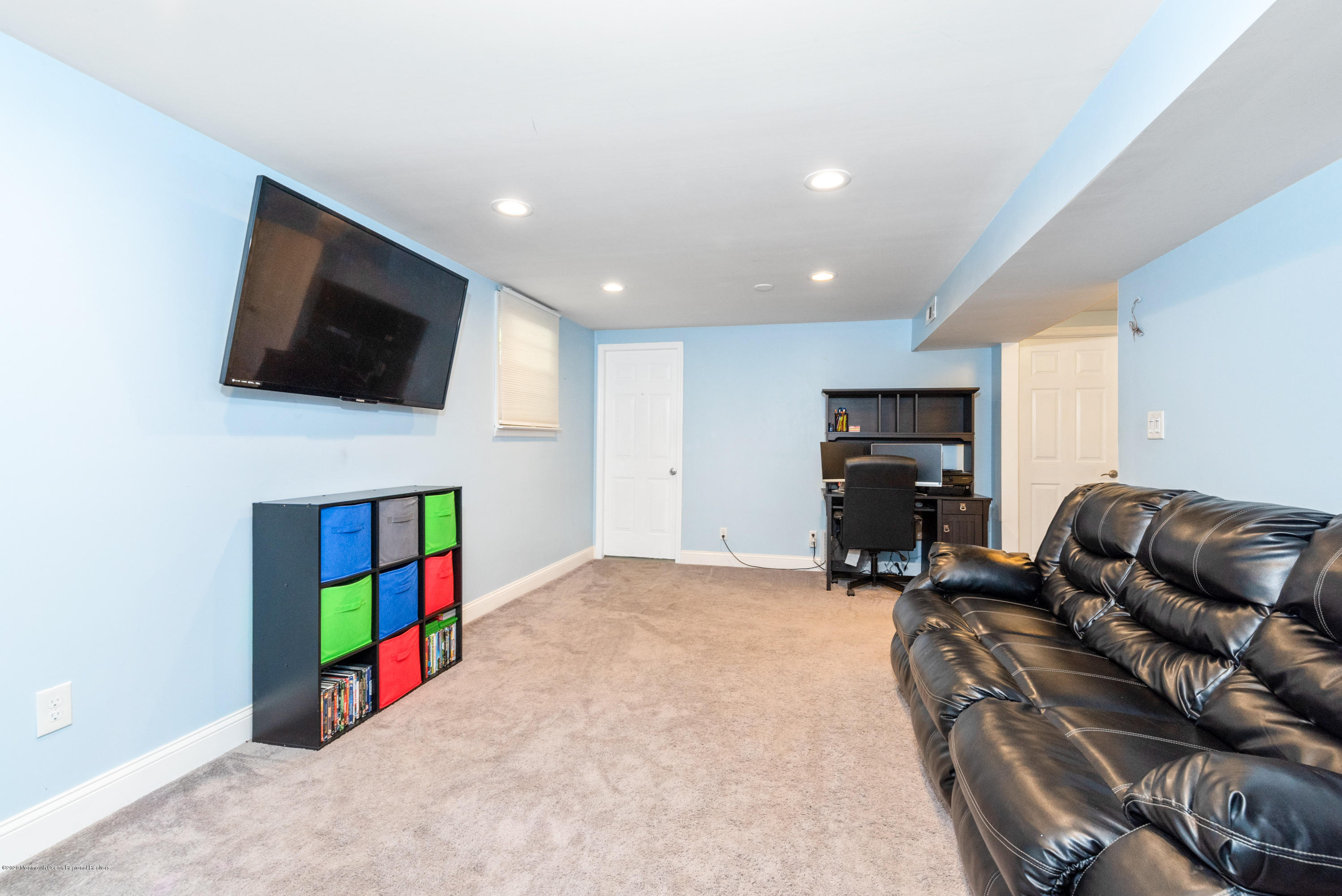 53 Salem Hill Road Howell, NJ 07731 - Photo 18 of 27 a living room with furniture and a flat screen tv