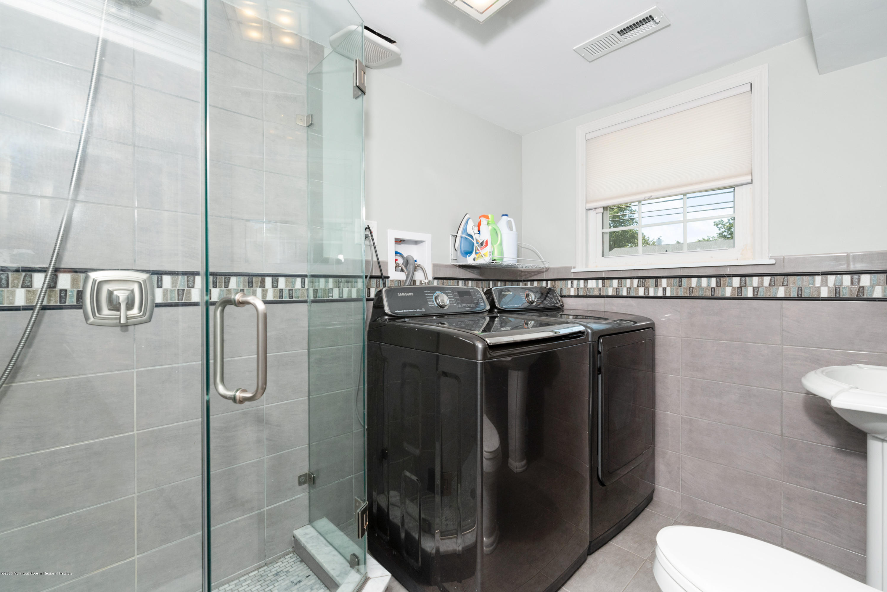 53 Salem Hill Road Howell, NJ 07731 - Photo 19 of 27 a bathroom with a sink a toilet and a shower