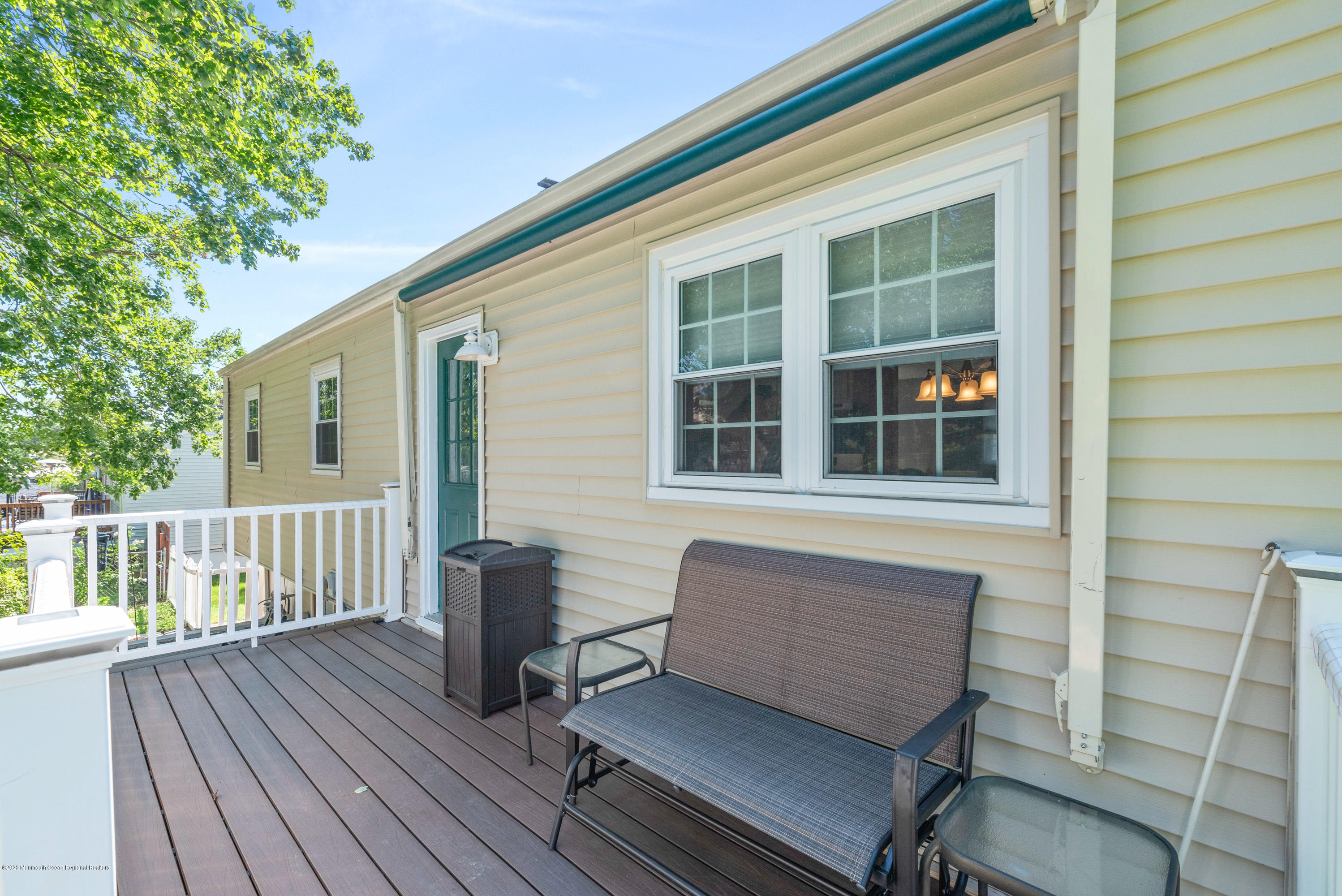 53 Salem Hill Road Howell, NJ 07731 - Photo 21 of 27 a balcony with wooden floor outdoor seating and deck