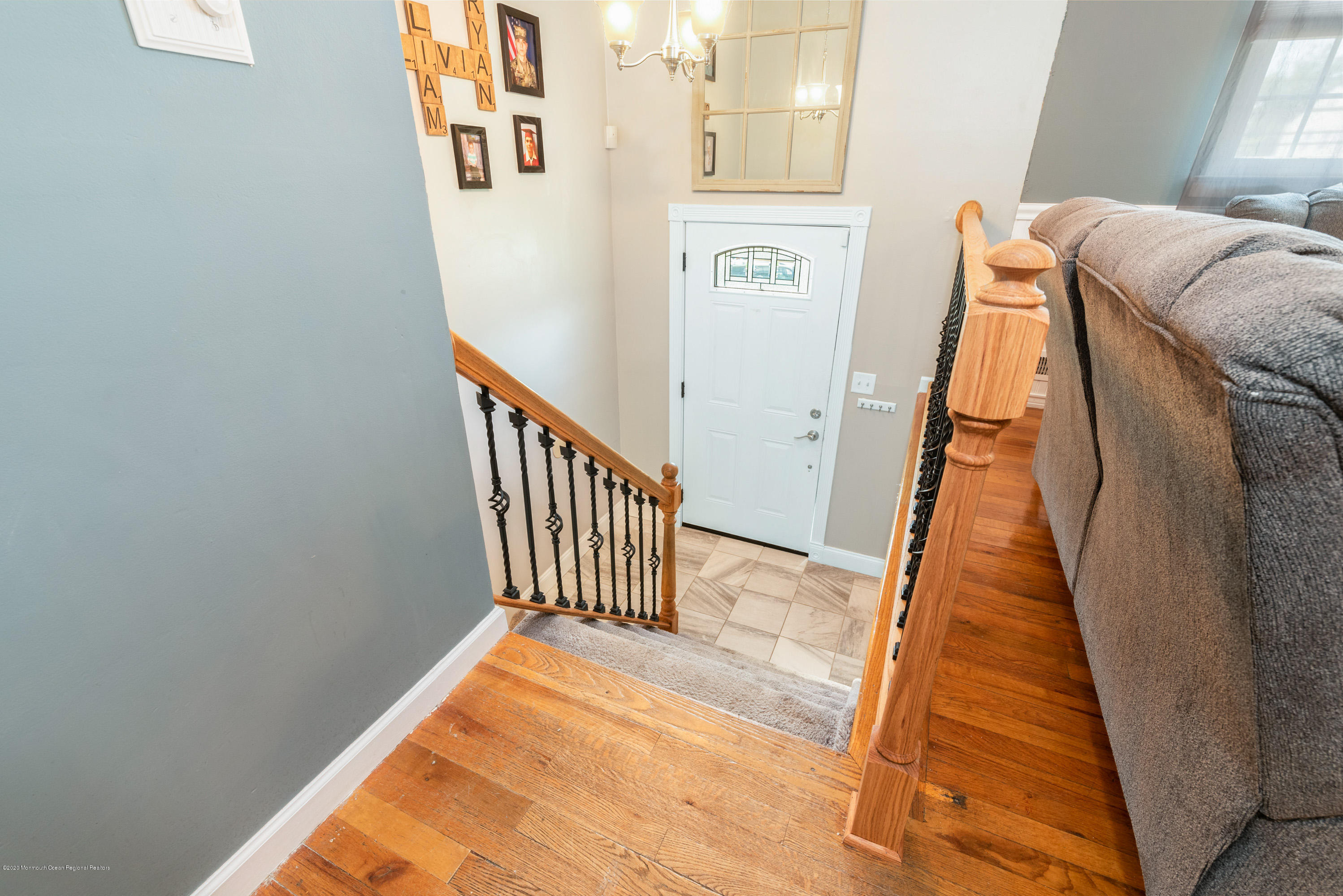 53 Salem Hill Road Howell, NJ 07731 - Photo 4 of 27 a view of a hallway with wooden floor and stairs