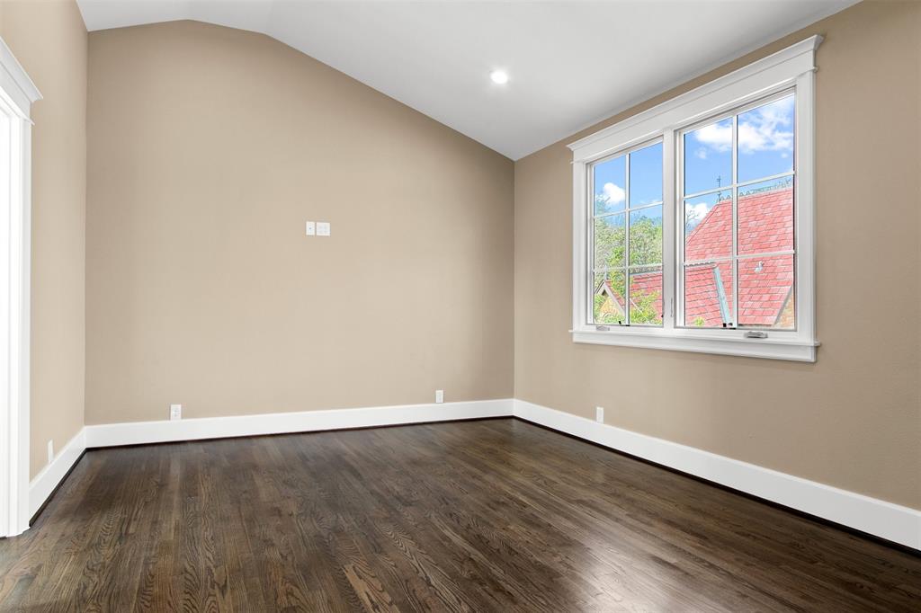 5230 Homer Street Dallas, TX 75206 - Photo 32 of 39 an empty room with wooden floor and windows