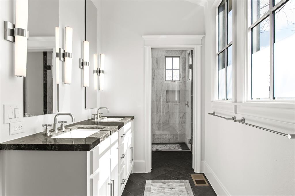5230 Homer Street Dallas, TX 75206 - Photo 34 of 39 a bathroom with a granite countertop sink and a mirror