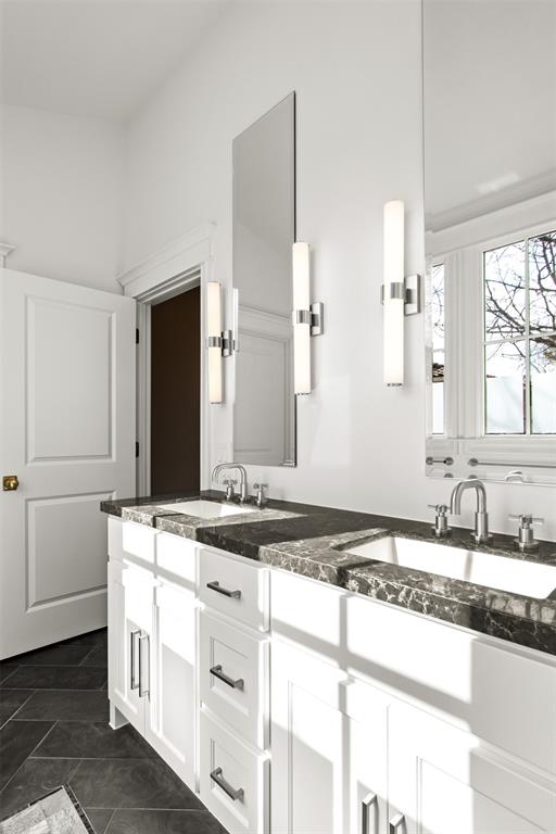 5230 Homer Street Dallas, TX 75206 - Photo 35 of 39 a bathroom with a granite countertop sink and a mirror