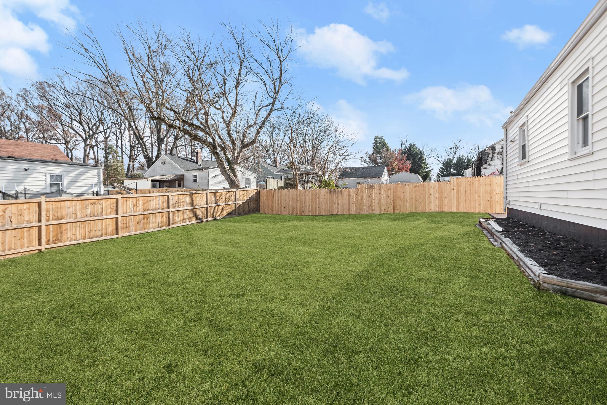 11813 Goodloe Road Silver Spring, MD 20906 - Photo 28 of 34 Fully Fenced Backyard | Secure Storage | Deck
