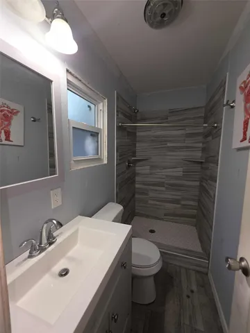 a view of hallway with livingroom and couch