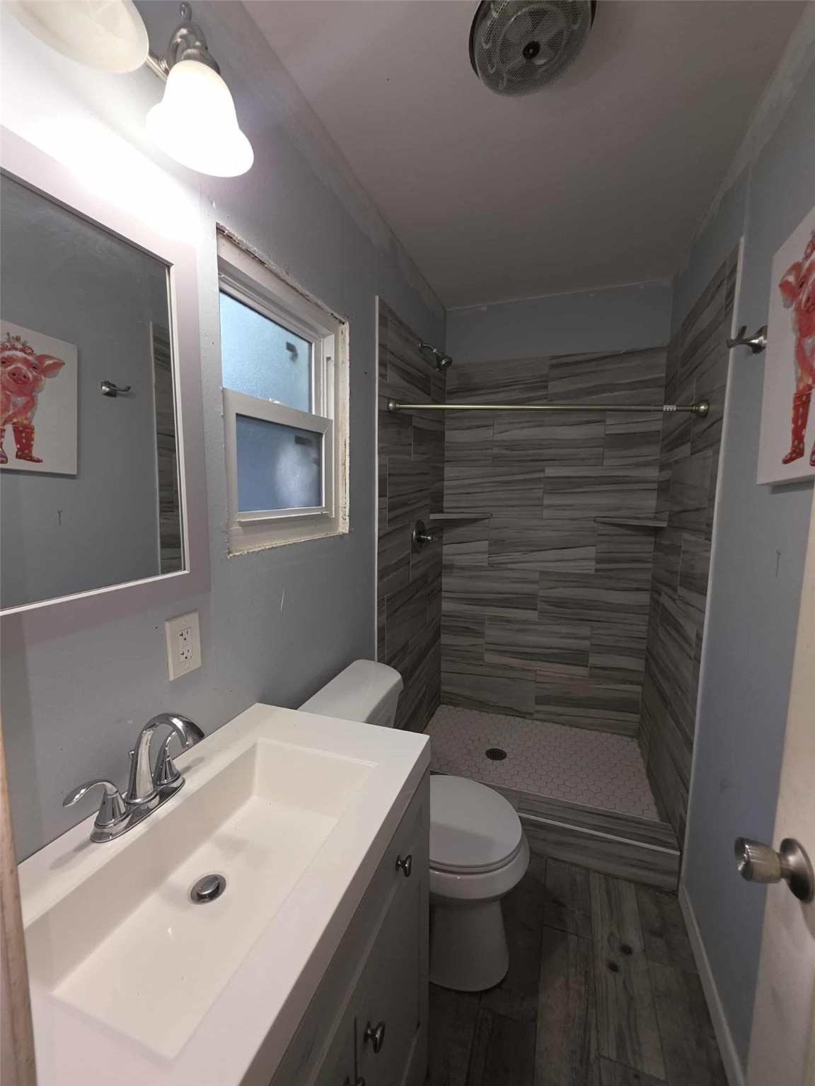 115 Bell Street Point Comfort, TX 77978 - Photo 16 of 24 a bathroom with a sink toilet and shower