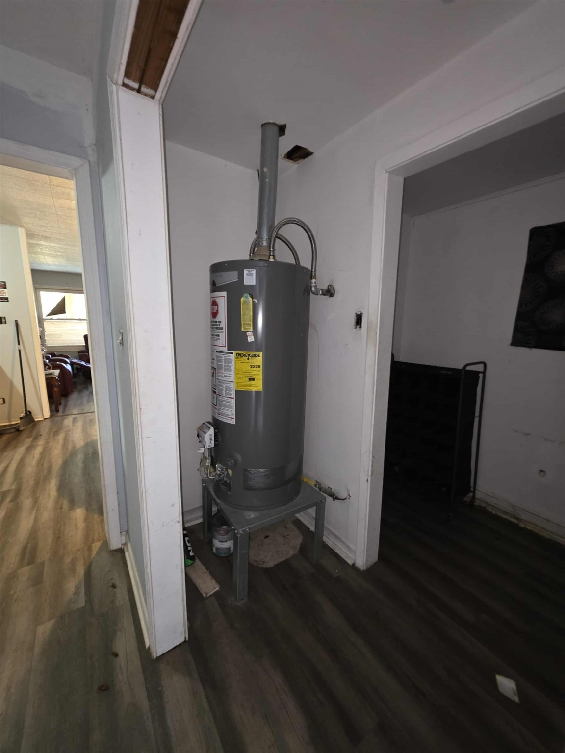 115 Bell Street Point Comfort, TX 77978 - Photo 17 of 24 a view of hallway with livingroom and couch