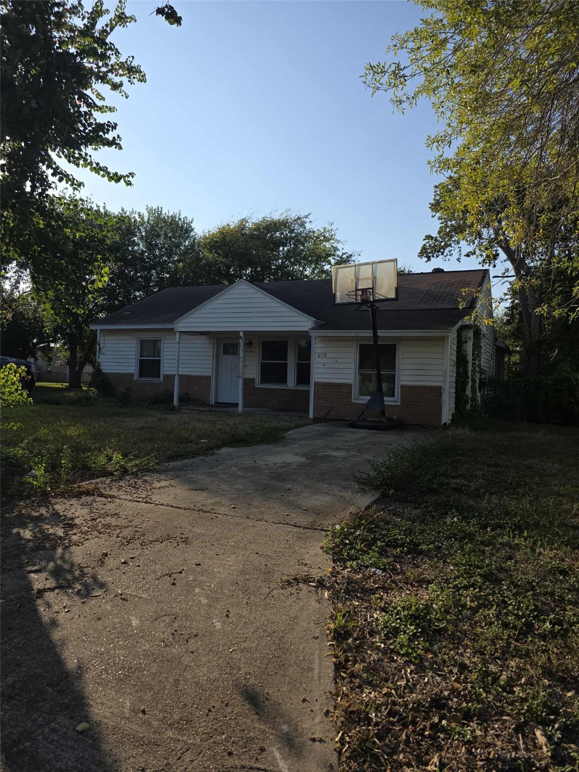 115 Bell Street Point Comfort, TX 77978 - Photo 2 of 24 a front view of a house with a yard