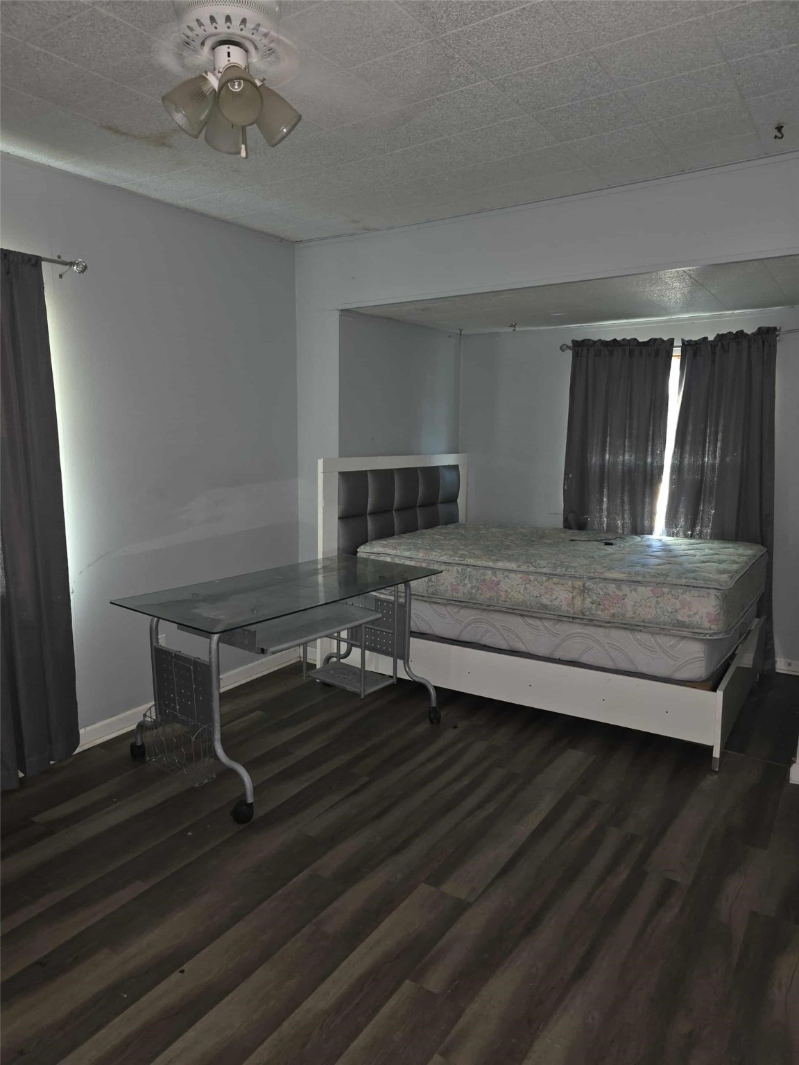 115 Bell Street Point Comfort, TX 77978 - Photo 22 of 24 a bedroom with furniture and window