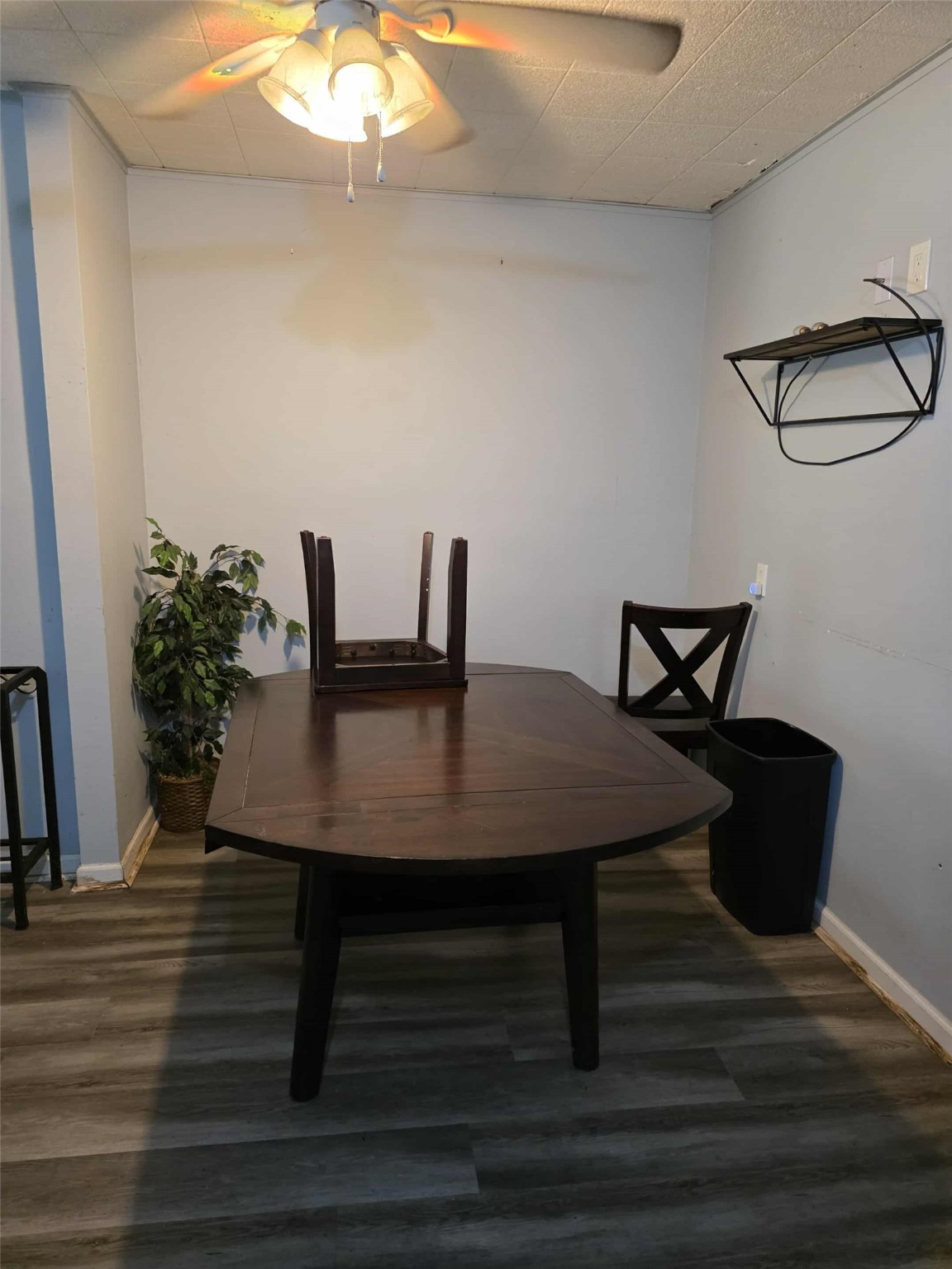 115 Bell Street Point Comfort, TX 77978 - Photo 23 of 24 a view of a dining room with furniture and wooden floor